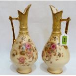 A pair of S. Fielding & Co 'Elm' ewers decorated with scattered flowers in colours and gilded.