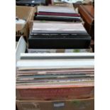 Three boxes of long playing records