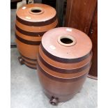 A pair of stoneware barrels. 22'' high