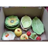 A quantity of Devon Ware and other green leaf and fruit moulded ceramics