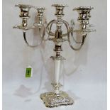 A silver plated candelabrum of five lights on reeded scrolled branches. 16½'' high