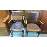 A pair of 1920's caned elbow chairs on cabriole legs