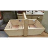 A light oak trug basket