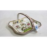 A Spode basket, gilded and painted in colours with two birds in a garden. 7¾'' wide