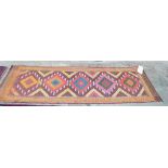 A Suzni kilim runner 59cm x 185cm