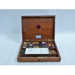 A Reeves Student's watercolour paint box. 10'' wide