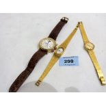 Two Tissot plated lady's wristwatches and a Sekonda gentleman's wristwatch