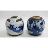 Two Chinese blue and white decorated jars. One cracked, covers lacking