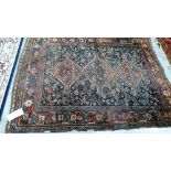 A brown ground eastern rug. 82'' x 62''