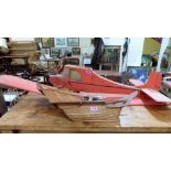 A model balsawood aeroplane and a model of a Chinese junk