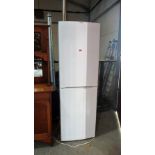 A Bosch fridge-freezer finished in white enamel. Ex house clearance