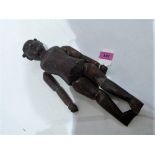 An early 19th century painted oriental carved hardwood lay figure with fully reticulated limbs. 14''