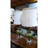 An impressive pair of gilt metal, green glass and marble table lamps, the bases 23'' high