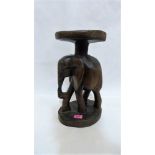 A carved treen elephant lamp stand. 16'' high