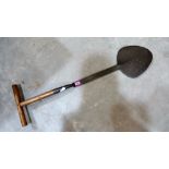 A peat shovel