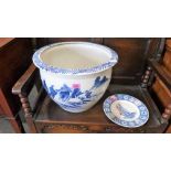 A blue and white aspidistra pot and a Wedgwood plate