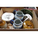 A box of ceramics with two stoneware jars