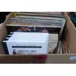 A box of long playing vinyl records