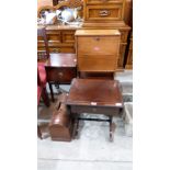 A telephone table; a drop leaf occasional table; an oak workbox and a sewing machine