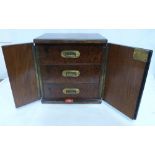 A Victorian burr walnut and brass mounted humidor, the three drawers with military handles