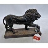 A Victorian cast iron lion doorstop. 9'' wide