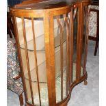 An oak veneered glazed china display cabinet. 42'' wide