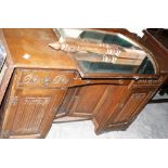 An Old Charm linen fold carved oak dressing table