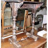 An oak occasional table on baluster turned legs