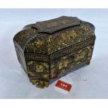 A Regency period japanned tea caddy, all over gilded with garden scenes and foliage, on gilded paw