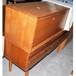 A 1970's 'retro' teak sideboard; a blanket box and a small ottoman