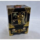 A Japanese black lacquer jewellery casket with brass mounts and mother-of-pearl inlay. Of recent