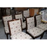 A set of six continental mahogany dining chairs, the set to include one carver