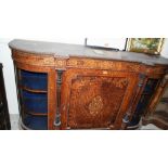 A Victorian burr wood and inlaid side cabinet enclosed by a centre door with flanking pilasters