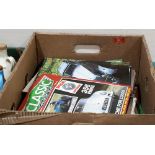 A box of classic car magazines