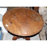 A Victorian mahogany tripod table on baluster column and moulded legs. 26'' diameter