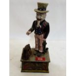 A cast iron 'Uncle Sam' money box. 11'' high