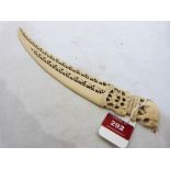 A carved Indian ivory page turner. 13¼'' long