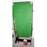 A 5' snooker table with balls