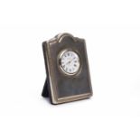 SILVER EASEL BACKED TRAVEL CLOCK maker 'RC', London 1994, with shaped frame,