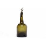 GEORGIAN HAND-BLOWN GREEN GLASS BOTTLE of mallet form and with deep pontil, with stopper,