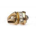 MID TWENTIETH CENTURY EIGHTEEN CARAT GOLD GEM SET RING with a central row of white gems, size M,