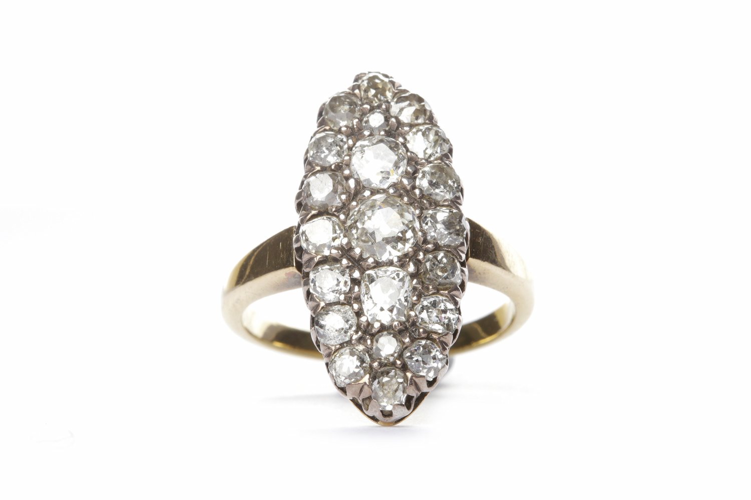 VICTORIAN DIAMOND RING the marquise shaped bezel set with three principal old round brilliant cut