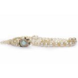 EARLY TWENTIETH CENTURY PEARL NECKLACE formed by three rows of graduated pearls,