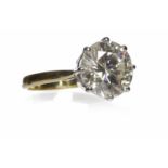 IMPRESSIVE DIAMOND SOLITAIRE RING the eight claw set round brilliant cut diamond of approximately 4.