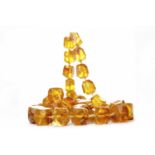 BALTIC AMBER NECKLACE formed by graduated faceted beads,