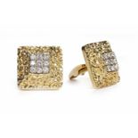 PAIR OF FOURTEEN CARAT GOLD DIAMOND SET CUFF LINKS each set with nine round diamonds,