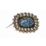 GEORGE IV BROOCH the central oval ceramic cabochon surrounded by split pearls,