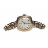 TWO LADY'S EARLY TWENTIETH CENTURY NINE CARAT GOLD MANUAL WIND WRIST WATCHES one with a round gold