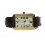 GENTLEMAN'S CARTIER GOLD PLATED MANUAL WIND WRIST WATCH the rectangular dial with Roman numerals in