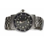 GENTLEMAN'S TAG HEUER PROFESSIONAL STAINLESS STEEL QUARTZ WRIST WATCH the round black dial with